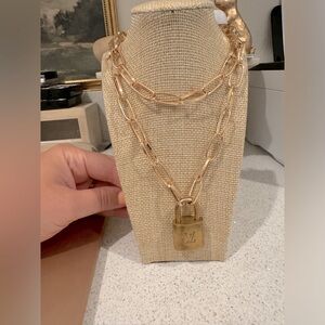 Unbranded necklace with authentic LV lock